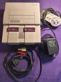 Super NES System with wires and 1 controller